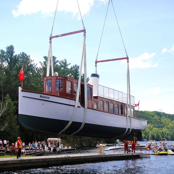Relaunch day, 2012 — lowered back into Lake of Bays after a decade of restoration